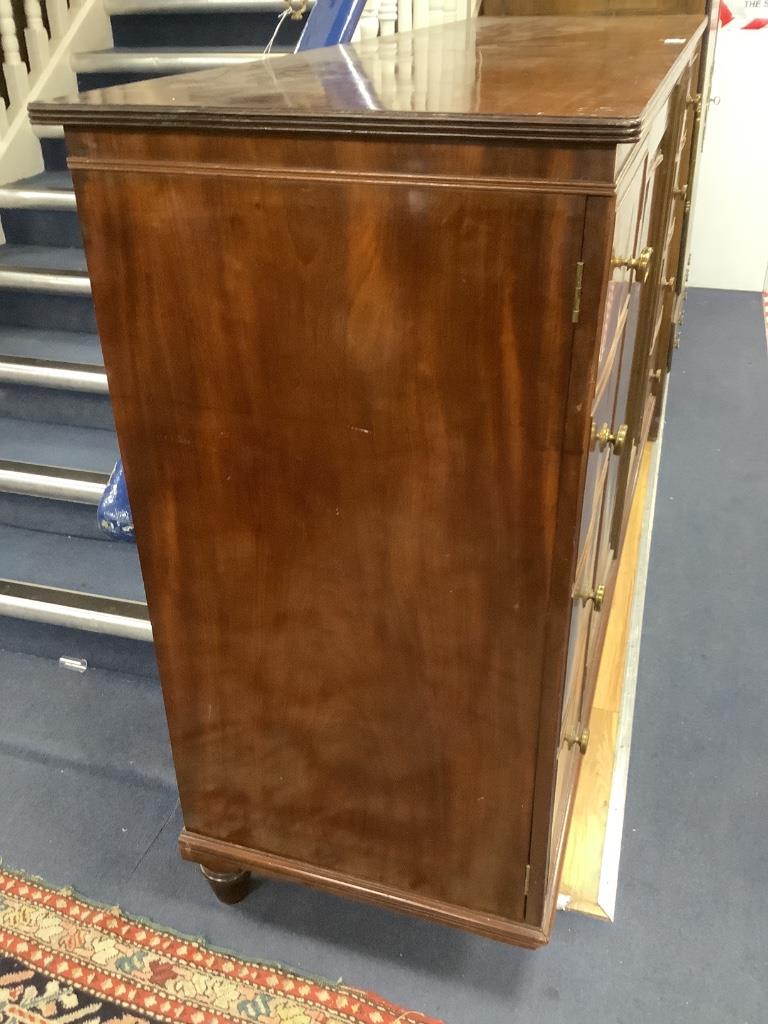 A Regency mahogany press cupboard